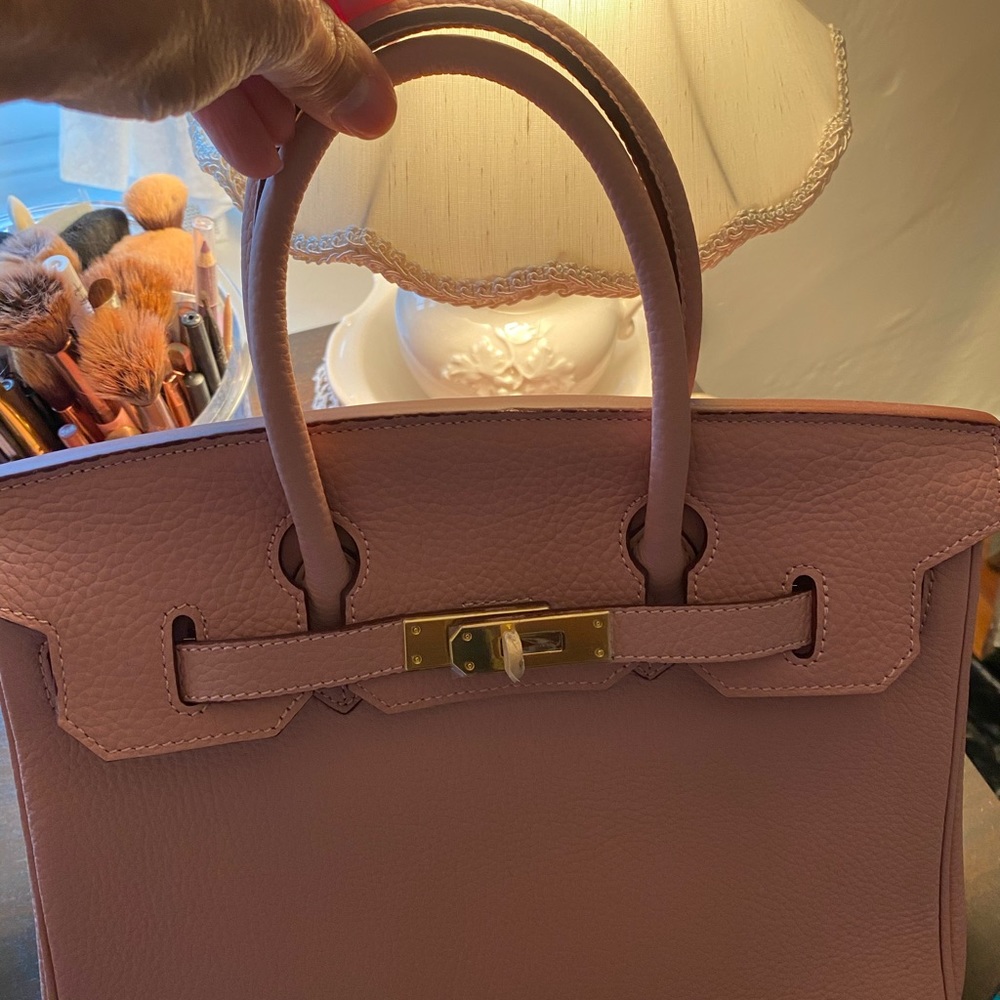 Designer inspired Kelly bag in dusty rose pink.